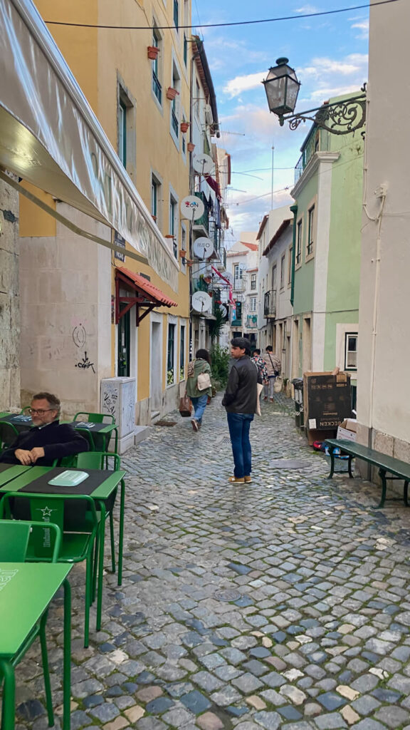 vibrant streets of alfama neighborhood lisbon travel guide