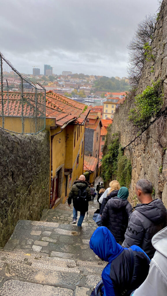 a beautiful yellow-colored house standing in the streets of Porto