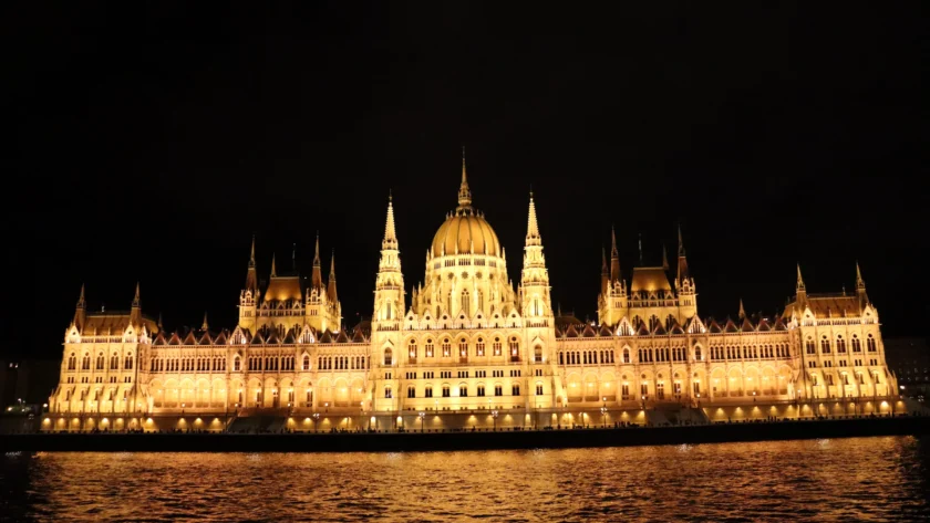 Favorite travel moments of 2025: Budapest Parliament illuminated at night during an evening cruise on the Danube River